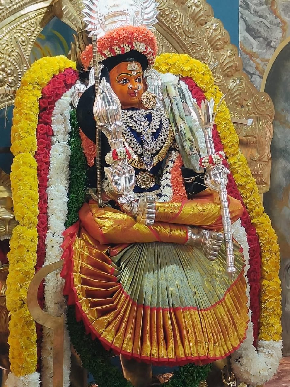 Divine goddess deity image with traditional temple decorations